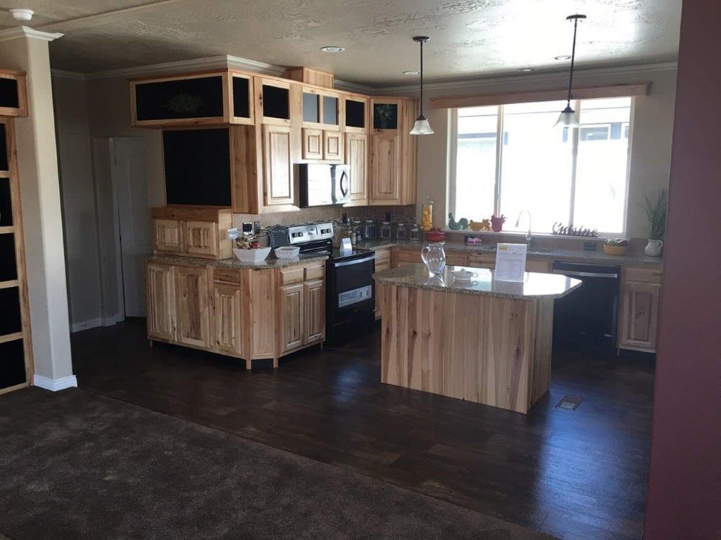 The ING561F SPRUCE       (FULL) GW Kitchen. This Manufactured Mobile Home features 3 bedrooms and 2 baths.